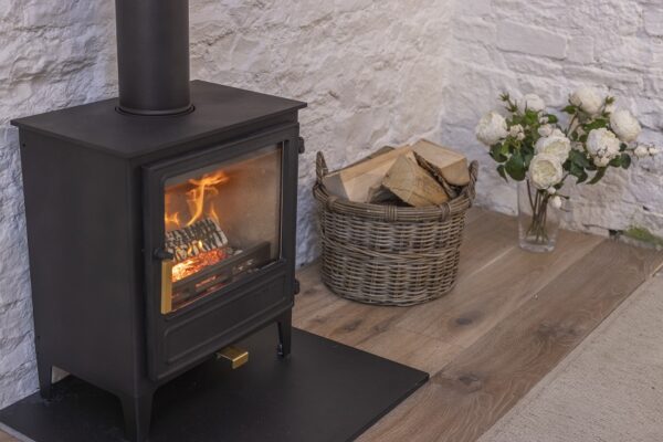The Ironwood Thaw 5kw - The Ironwood Thaw 5Kw Wide is the first wood burning stove of its kind to be made in South Wales. Designed by the team at Topstak, the Ironwood Stove has been manufactured to the best quality using Welsh steel from Tata Steel in Port Talbot. Each component has been manufactured nearby in Bridgend and welded and assembled at Topstak ensuring a low carbon footprint.