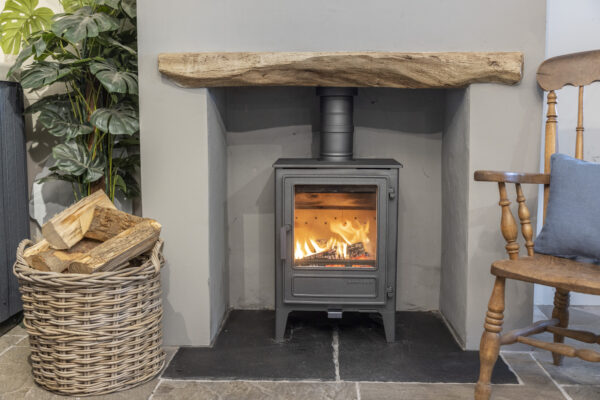 The Ironwood Monnow 5kw - The Ironwood Monnow 5Kw is the first wood burning stove of its kind to be made in South Wales. Designed by the team at Topstak, the Ironwood Monnow has been manufactured to the best quality using Welsh steel from Tata Steel in Port Talbot. Each component has been manufactured nearby in Bridgend and welded and assembled at Topstak ensuring a low carbon footprint.